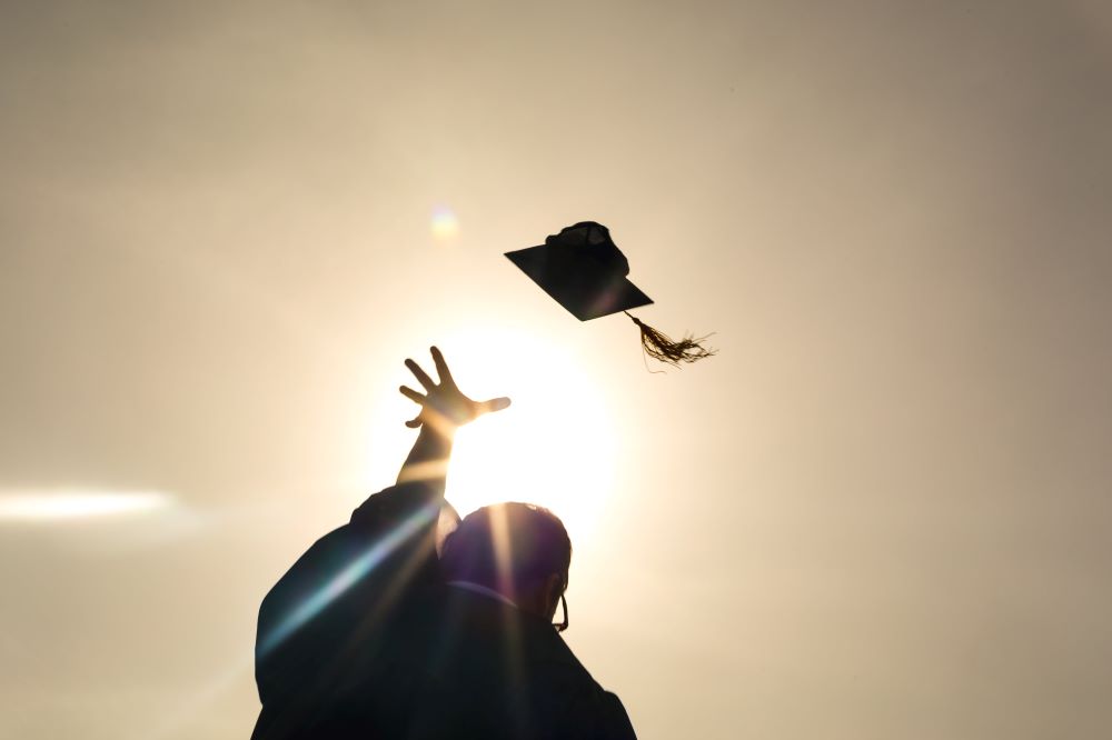 Student Throwing Graduation Cap in the Air
