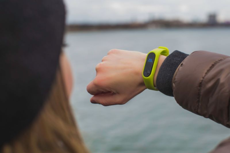 Woman Checking Fitness Tracker